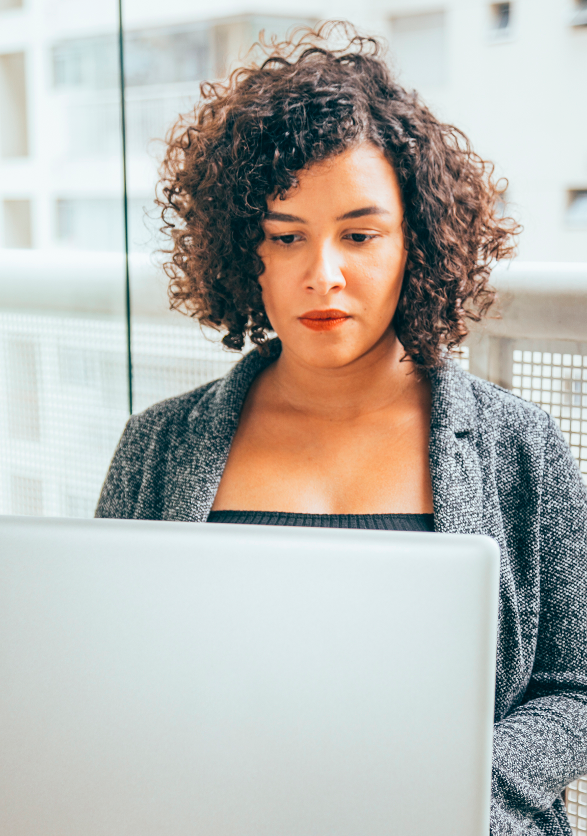 Woman lookin computer screen